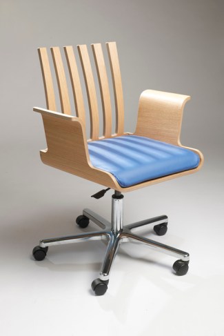 The utilitarian Rake Desk Chair is upholstered in leather and finished with your choice of casters or stackable bent steel legs.