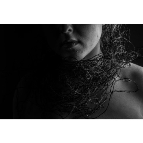 Instagram media by beccacoxdesign - I twisted over 100m (I lost count) of wire, pulled, tugged & oxidised to create very atmospheric overwhelming suffocating neck pieces #jewellery #design #art #fashion #statement #neckwear #dark