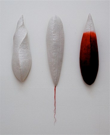'tri-pods' 2006 17" x 4" x 4" each industrial felt, fibre reactive dye, embroidery thread, hand stitching 