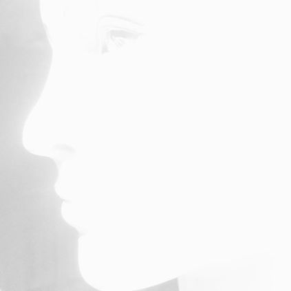 Her disappearance in light.