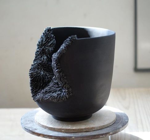 This is the piece I posted in its raw state a few days ago. I fired the clay a few degrees under its top temperature to keep a graphite charcoal quality to the colour. . . . . . #charcoal #grey #porcelain #bowl #texture #decay #growth #studioceramics #ceramics #ceramica #ceramique #livefolk